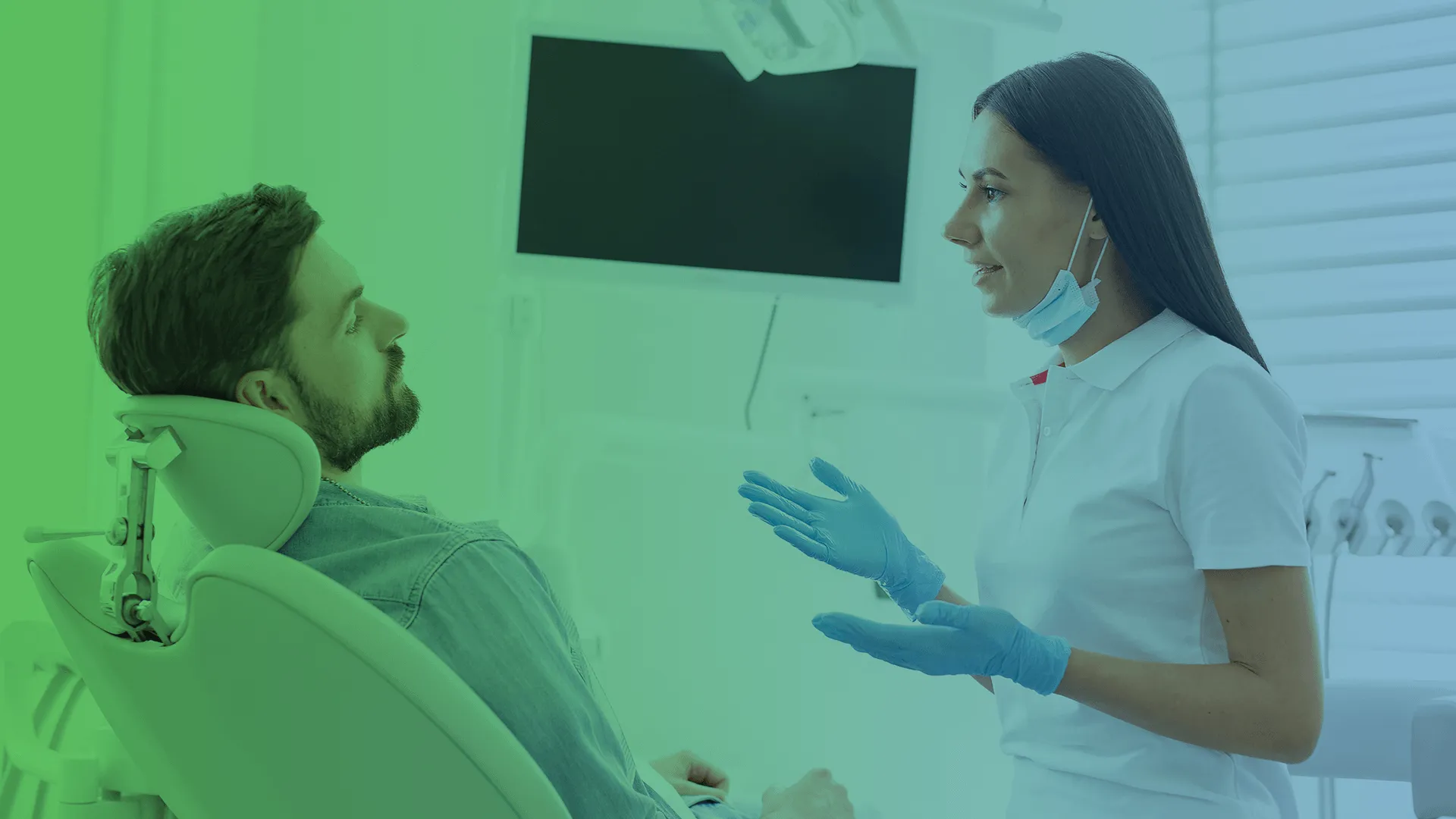 Dentist talking to patient