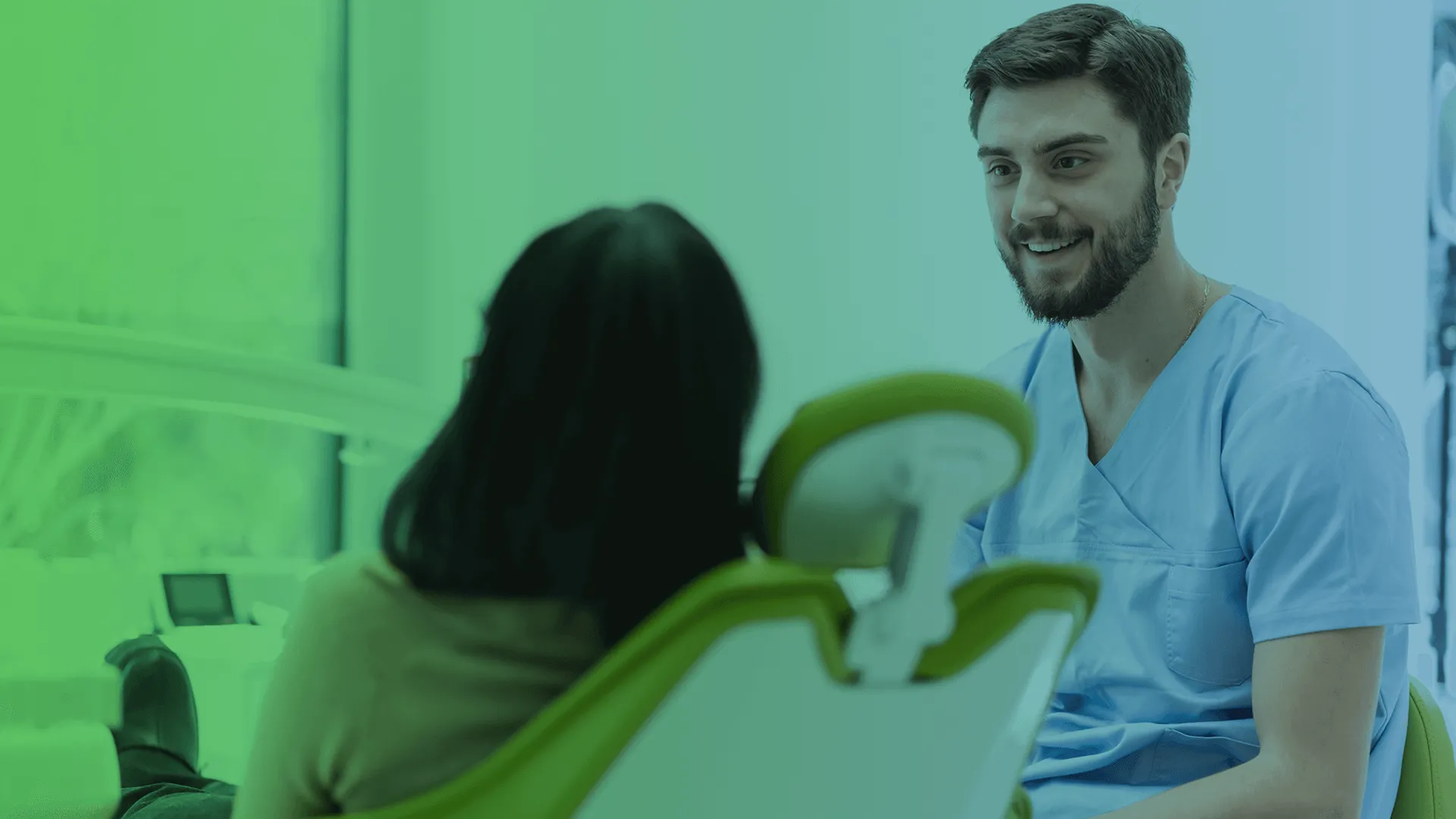 Dentist talking to patient