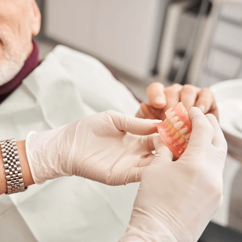 Image of person showing dentures